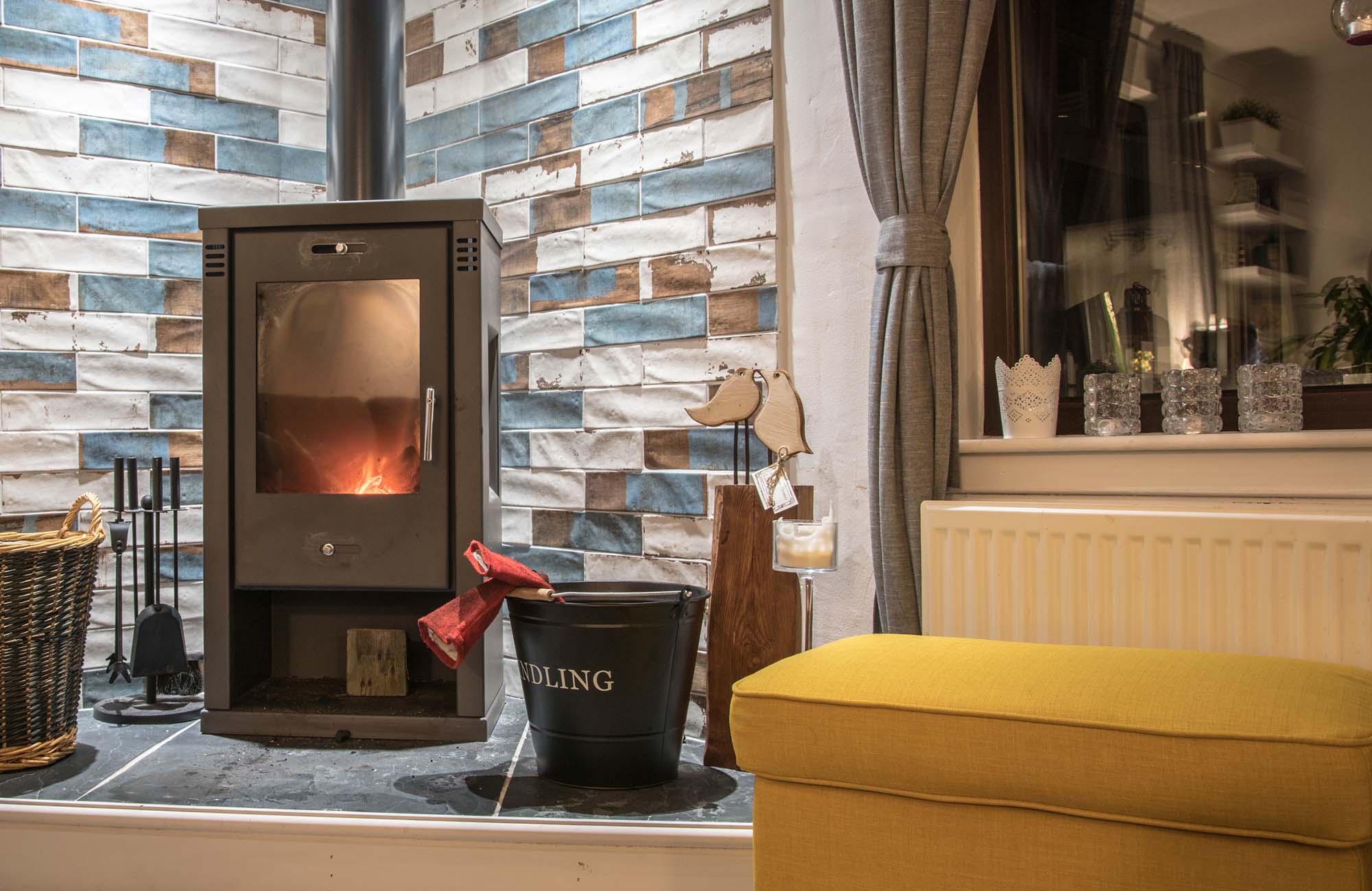 Modern wood burning stove in the house - efficient heating